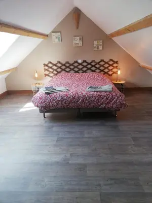 Un ou plusieurs lits dans un hébergement de l'établissement La Grange de la Chaise