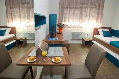 Coin salon dans l'établissement Appart'hôtel Odalys City - Tours Le Jardin des Lettres