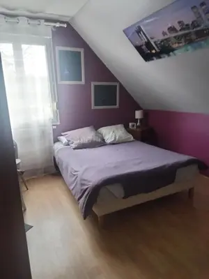 Un ou plusieurs lits dans un hébergement de l'établissement Les stands 4 chambres - lits doubles