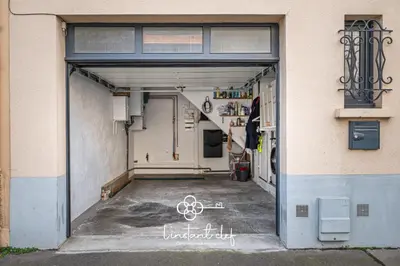 Façade ou entrée de l'établissement Évasion au Mans - Terrasse & Garage - L'Instant Clef