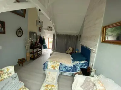 Un ou plusieurs lits dans un hébergement de l'établissement La Patriaie. chez Jacky et Maryse.