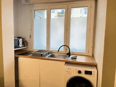 Cuisine ou kitchenette dans l'établissement Comtes du Maine - Centre - Parade des pilotes - 6 pers