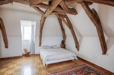 Un ou plusieurs lits dans un hébergement de l'établissement La Belonnerie - Grande maison pour 13