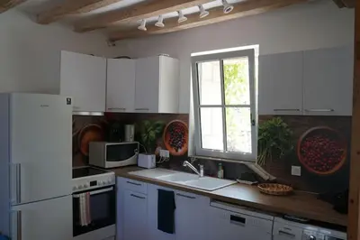 Cuisine ou kitchenette dans l'établissement Gîte Aliénor en Anjou