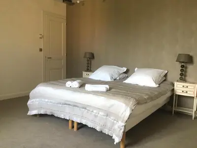 Un ou plusieurs lits dans un hébergement de l'établissement Villa Castalie - Maison de maître, grande piscine et jacuzzi, classée 5 étoiles