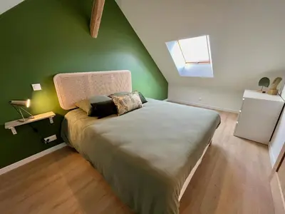 Un ou plusieurs lits dans un hébergement de l'établissement La maison de Paulette
