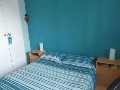 Un ou plusieurs lits dans un hébergement de l'établissement Chambres d'hôtes 24