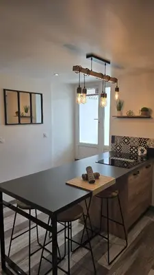 Cuisine ou kitchenette dans l'établissement Le Petit Caporal - Cour Privée - Parking Privée