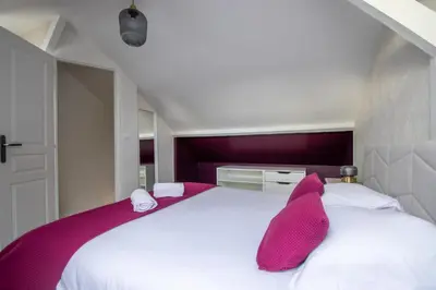 Un ou plusieurs lits dans un hébergement de l'établissement Home de Vitruve