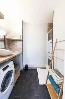 Un ou plusieurs lits dans un hébergement de l'établissement Appartement grande terrasse proche de Tours centre