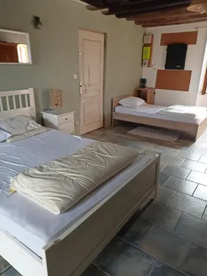 Un ou plusieurs lits dans un hébergement de l'établissement Chambre triple