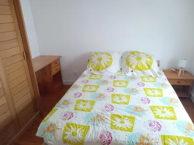 Un ou plusieurs lits dans un hébergement de l'établissement Location maison pour évènement le mans