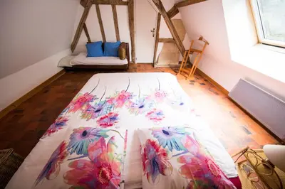 Un ou plusieurs lits dans un hébergement de l'établissement Holiday home Le Vaugarnier