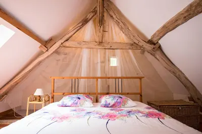 Un ou plusieurs lits dans un hébergement de l'établissement Holiday home Le Vaugarnier