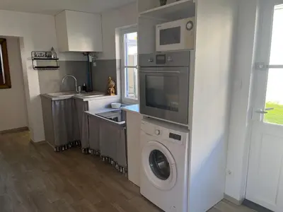 Cuisine ou kitchenette dans l'établissement LA PAUSE