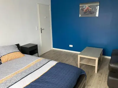 Un ou plusieurs lits dans un hébergement de l'établissement Maison belle capacité Avoine