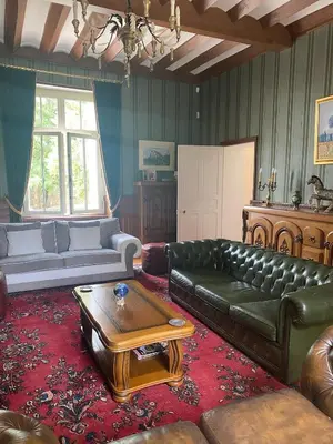 Coin salon dans l'établissement Clos de Joco - Gîte de groupe