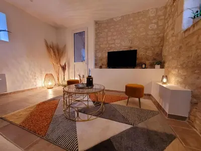 Télévision ou salle de divertissement dans l'établissement Gîte 5 étoiles Romantique Chic