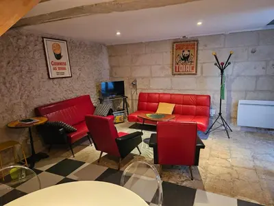 Coin salon dans l'établissement LA GRANGE DE LA VALLÉE DU CHER
