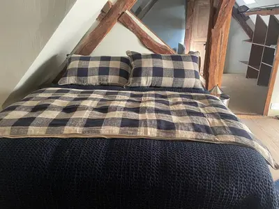 Un ou plusieurs lits dans un hébergement de l'établissement Gîte de charme entre Tours et Villandry