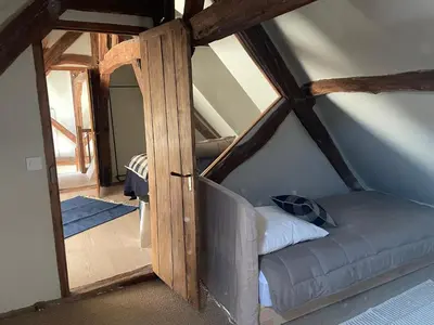 Un ou plusieurs lits dans un hébergement de l'établissement Gîte de charme entre Tours et Villandry