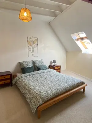 Un ou plusieurs lits dans un hébergement de l'établissement Maison - La campagne près de la ville