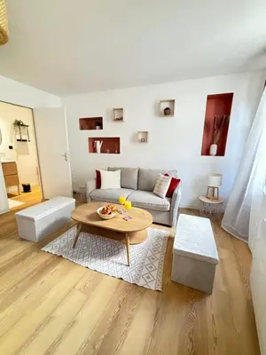 Coin salon dans l'établissement Le Duplex Safari