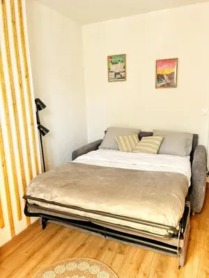 Un ou plusieurs lits dans un hébergement de l'établissement STUDIO COSY Gare & centre-ville