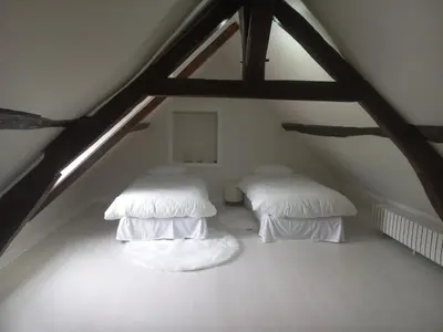Un ou plusieurs lits dans un hébergement de l'établissement La ferme du bonheur