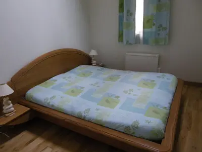 Un ou plusieurs lits dans un hébergement de l'établissement Gîte Desvergnes