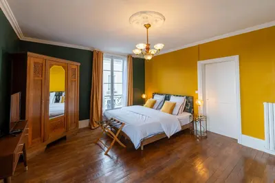 Un ou plusieurs lits dans un hébergement de l'établissement Villa du Loir