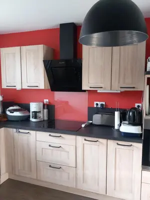 Cuisine ou kitchenette dans l'établissement Maison climatisée proche circuit des 24H