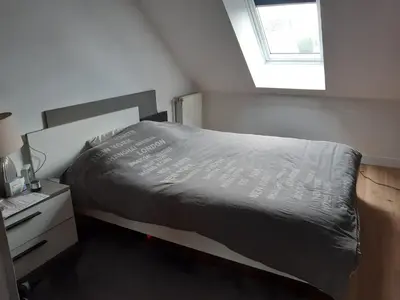 Un ou plusieurs lits dans un hébergement de l'établissement Maison climatisée proche circuit des 24H
