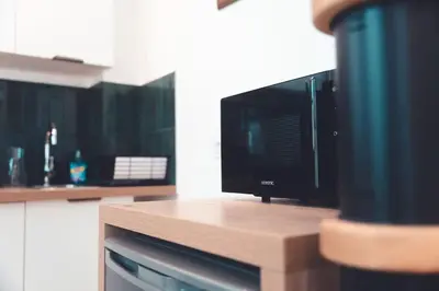 Cuisine ou kitchenette dans l'établissement Le Colimaçon