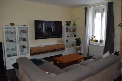 Télévision ou salle de divertissement dans l'établissement Location24hLemans