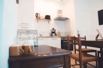 Cuisine ou kitchenette dans l'établissement Le Racine, Charmant T3 en centre ville