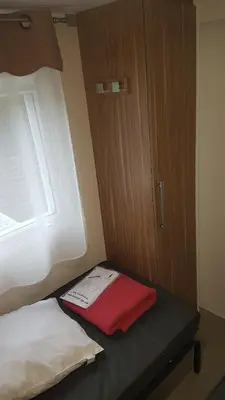 Un ou plusieurs lits dans un hébergement de l'établissement Mobil-home 3ch, 2 sdbwc, tout confort camping les allais Trogues