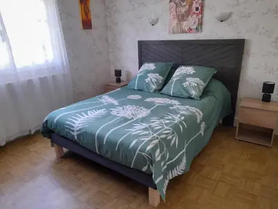 Un ou plusieurs lits dans un hébergement de l'établissement Villa Amazone