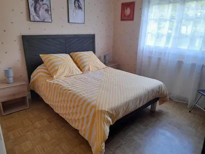 Un ou plusieurs lits dans un hébergement de l'établissement Villa Amazone