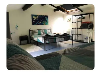 Un ou plusieurs lits dans un hébergement de l'établissement Gîte Au Boom Coeur - forfait SPA inclus