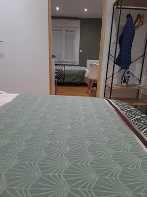 Un ou plusieurs lits dans un hébergement de l'établissement T2 Jacky IC. /Moto / Circuit 24h / Oasis /Antares