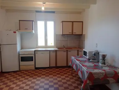 Cuisine ou kitchenette dans l'établissement Maison de campagne