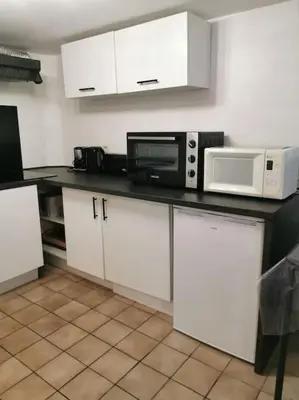 Cuisine ou kitchenette dans l'établissement studio rez-de-chaussée jusqu'à 4 personnes