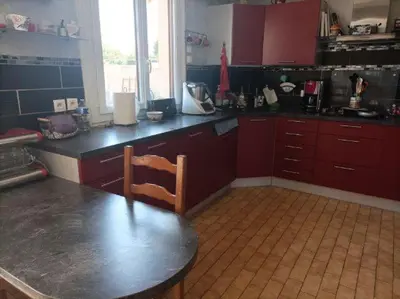 Cuisine ou kitchenette dans l'établissement Maison