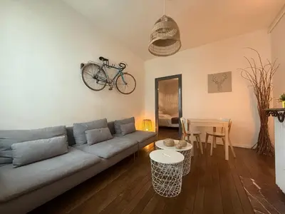 Coin salon dans l'établissement ARAGO1 - Appartement Tours centre sur jardin