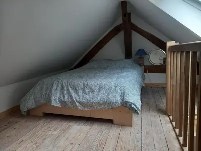 Un ou plusieurs lits dans un hébergement de l'établissement La grange