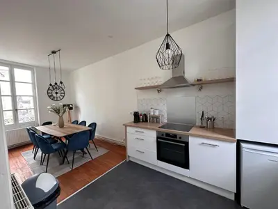 Cuisine ou kitchenette dans l'établissement Appartement cœur de ville