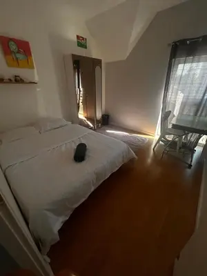 Un ou plusieurs lits dans un hébergement de l'établissement Maison calmer & confort