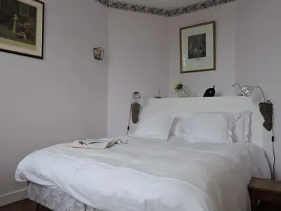 Un ou plusieurs lits dans un hébergement de l'établissement Le Domaine de Mestré, The Originals Relais