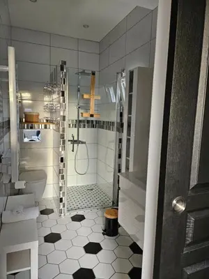 Salle de bains dans l'établissement Les chambres d'Estelle